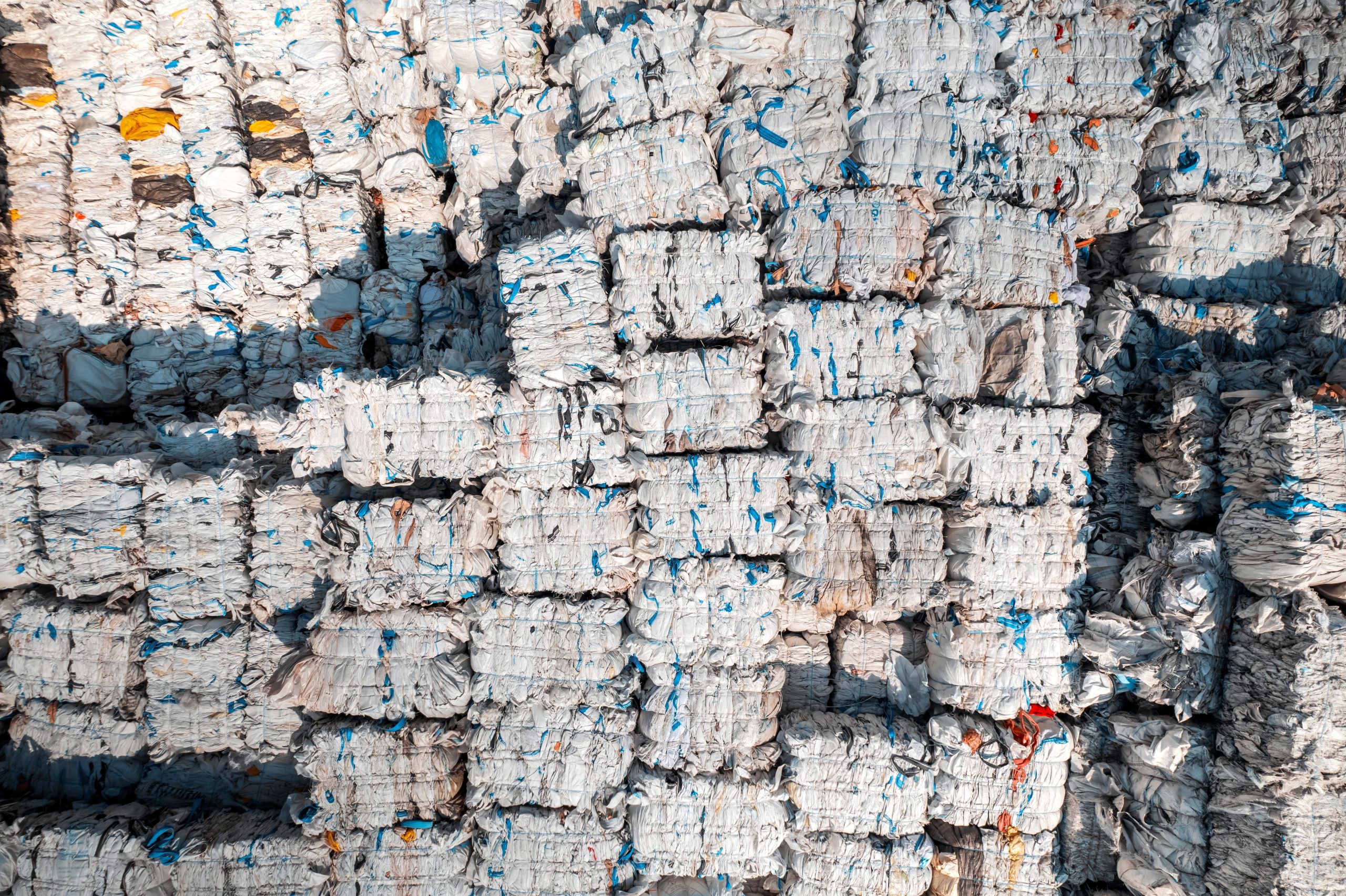 Multiple,Cubes,Of,Compressed,Plastic,Garbage,Near,The,Waste,Recycling